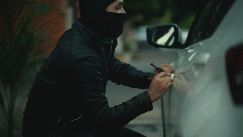 Stock Video Balaclava Assailant Steals Computer From Car Live Wallpaper For PC - Free Live Wallpaper