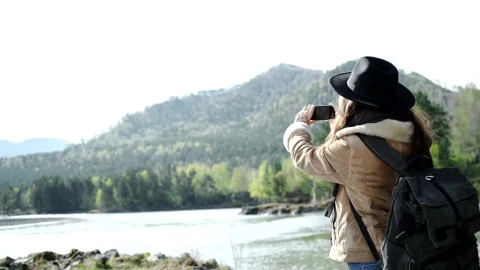 Stock Video Backpacker Takes Panoramic Photo Of River And Mountains Live Wallpaper For PC - Free Live Wallpaper