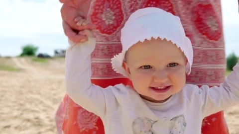 Stock Video Baby Walking With Help From Their Mother Live Wallpaper For PC - Free Live Wallpaper