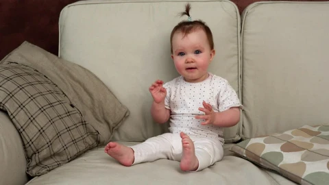 Stock Video Baby Smiling On The Sofa Live Wallpaper For PC - Free Live Wallpaper