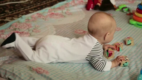 Stock Video Baby Playing With Cubes Over A Blanket Live Wallpaper For PC - Free Live Wallpaper