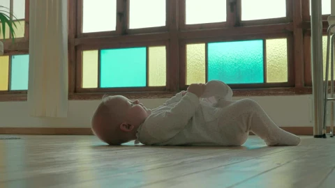 Stock Video Baby Holding Their Foot Live Wallpaper For PC - Free Live Wallpaper