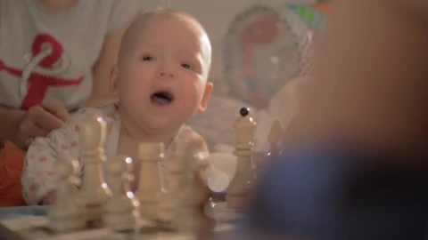 Stock Video Baby Girl Watching A Chess Game Live Wallpaper For PC - Free Live Wallpaper