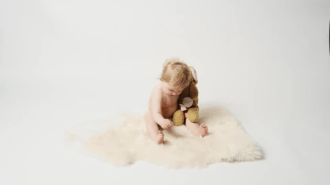 Stock Video Baby Girl Playing With Plushie In The Studio Live Wallpaper For PC - Free Live Wallpaper