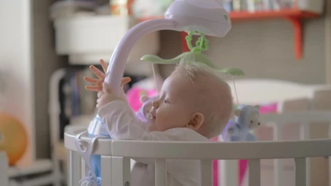 Stock Video Baby Girl Holding Onto Her Crib Live Wallpaper For PC - Free Live Wallpaper