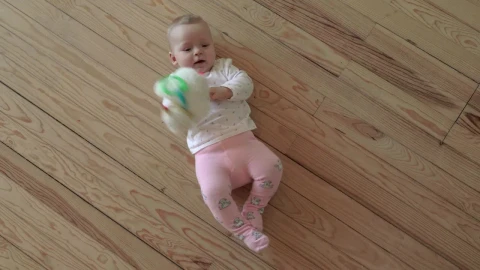 Stock Video Baby Girl Holding A Soft Toy Live Wallpaper For PC - Free Live Wallpaper