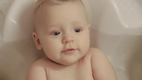 Stock Video Baby Girl Chewing A Bath Toy Live Wallpaper For PC - Free Live Wallpaper