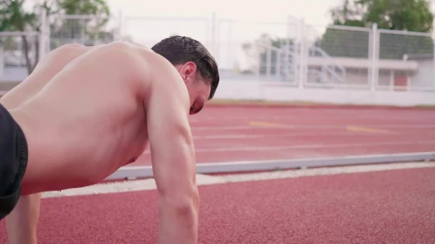 Stock Video Athletic Man Doing Push Ups On A Running Track Live Wallpaper For PC - Free Live Wallpaper