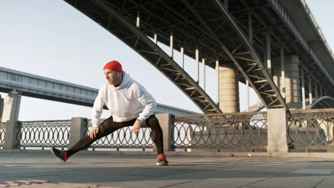 Stock Video Athlete Stretching His Legs In The Street Live Wallpaper For PC - Free Live Wallpaper