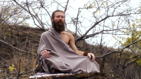 Stock Video Ascetic Yogi Sitting In Nature Meditating Live Wallpaper For PC - Free Live Wallpaper