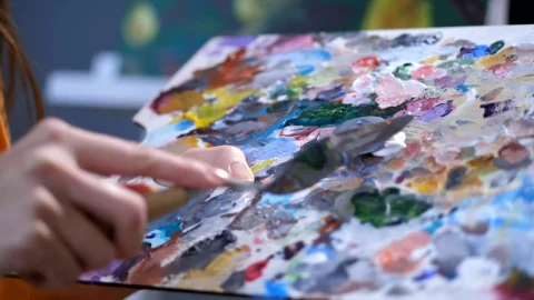 Stock Video Artist Mixing Paints On A Board Live Wallpaper For PC - Free Live Wallpaper