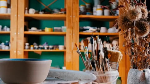 Stock Video Artist Looking For Paints In His Workshop Live Wallpaper For PC - Free Live Wallpaper