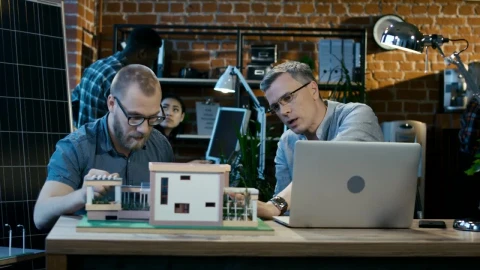 Stock Video Architects Working On A House Model In The Office Live Wallpaper For PC - Free Live Wallpaper