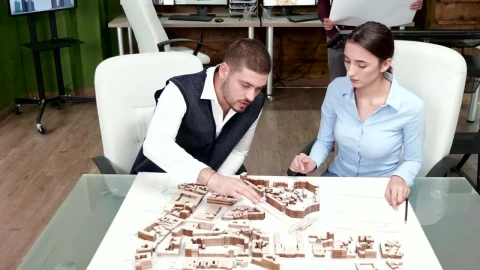 Stock Video Architects Collaborate On Project Ideas With d Model Live Wallpaper For PC - Free Live Wallpaper