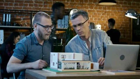 Stock Video Architects Checking A House Model At The Office Live Wallpaper For PC - Free Live Wallpaper