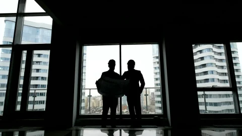 Stock Video Architects Checking A Blueprint On A Building Live Wallpaper For PC - Free Live Wallpaper