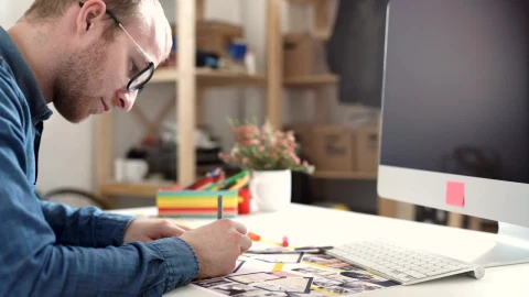 Stock Video Architect Working On A Blueprint In His Office Live Wallpaper For PC - Free Live Wallpaper