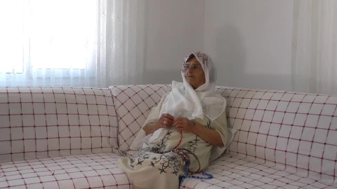 Stock Video Arab Old Woman Praying With A Rosary At Home Live Wallpaper For PC - Free Live Wallpaper