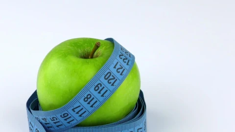 Stock Video Apple And Measuring Tape On White Background Live Wallpaper For PC - Free Live Wallpaper