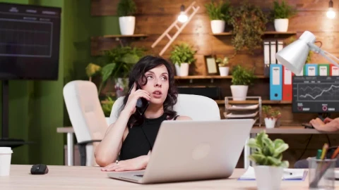 Stock Video Angry Woman Screams Into Mobile Phone In Office Live Wallpaper For PC - Free Live Wallpaper
