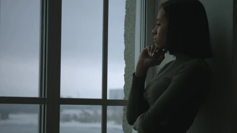 Stock Video An Upset Young Woman By The Window Live Wallpaper For PC - Free Live Wallpaper