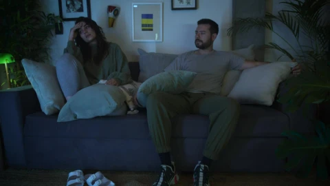 Stock Video An Upset Couple While Watching Television Live Wallpaper For PC - Free Live Wallpaper