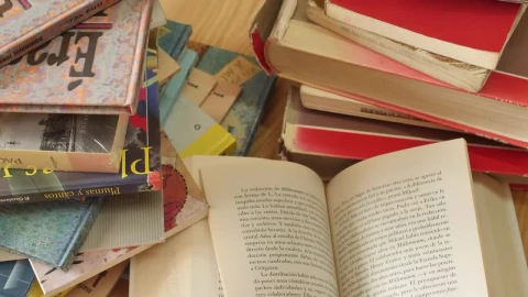 Stock Video All Kinds Of Books Stacked On A Table Seen Up Live Wallpaper For PC - Free Live Wallpaper