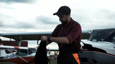 Stock Video Airplane Mechanic Looking Into The Distance Live Wallpaper For PC - Free Live Wallpaper