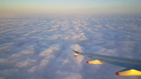 Stock Video Airplane Flying Above Beautiful Fluffy Clouds Live Wallpaper For PC - Free Live Wallpaper