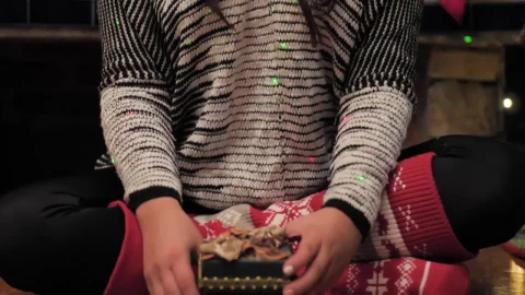 Stock Video A Young Woman Opens A Christmas Present Live Wallpaper For PC - Free Live Wallpaper
