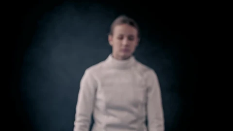 Stock Video A Young Woman Fencer Posing With Her Sword Live Wallpaper For PC - Free Live Wallpaper