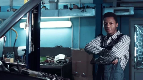 Stock Video A Young Mechanic Posing For The Camera Live Wallpaper For PC - Free Live Wallpaper