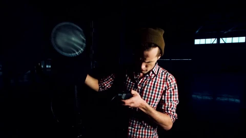 Stock Video A Young Man Turns On A Studio Light Live Wallpaper For PC - Free Live Wallpaper