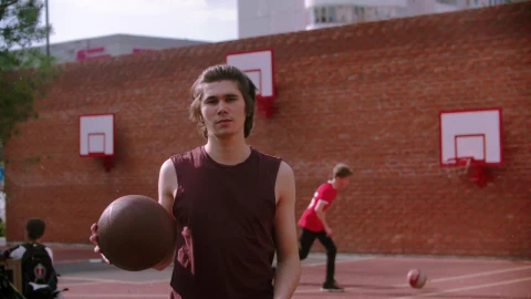 Stock Video A Young Man On The Basketball Court Bouncing The Ball Live Wallpaper For PC - Free Live Wallpaper