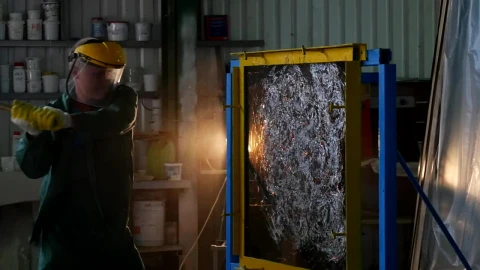 Stock Video A Worker With Protective Uniform Hitting A Glass Sheet Live Wallpaper For PC - Free Live Wallpaper