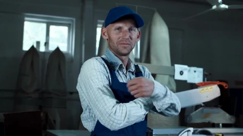 Stock Video A Worker In Overalls Looking At The Camera Live Wallpaper For PC - Free Live Wallpaper