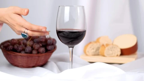 Stock Video A Womans Hand Takes A Glass Of Wine From An Live Wallpaper For PC - Free Live Wallpaper