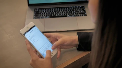 Stock Video A Woman Writing An Email On Her Smartphone Live Wallpaper For PC - Free Live Wallpaper