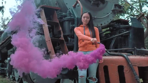 Stock Video A Woman Waving A Smoke Bomb On A Train Live Wallpaper For PC - Free Live Wallpaper