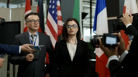 Stock Video A Woman Walks Away From Journalists Live Wallpaper For PC - Free Live Wallpaper