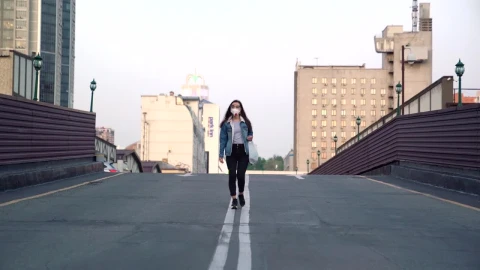 Stock Video A Woman Walking In The Middle Of An Empty Street Live Wallpaper For PC - Free Live Wallpaper