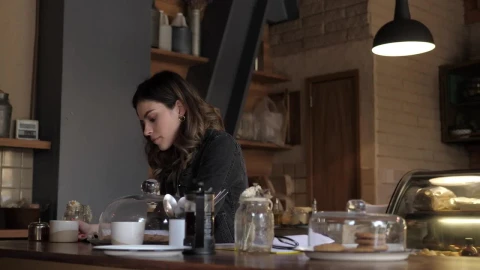 Stock Video A Woman Reading A Book At A Coffee Shop Live Wallpaper For PC - Free Live Wallpaper