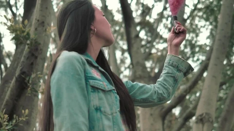Stock Video A Woman Holding A Pink Smoke Bomb Live Wallpaper For PC - Free Live Wallpaper