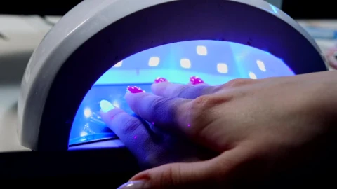 Stock Video A Woman Hand In A Uv Lamp Live Wallpaper For PC - Free Live Wallpaper