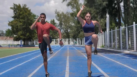 Stock Video A Woman And A Man Exercising On A Running Track Live Wallpaper For PC - Free Live Wallpaper
