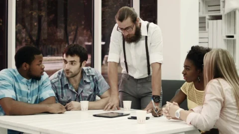 Stock Video A Team Having A Conversation In A Table Live Wallpaper For PC - Free Live Wallpaper