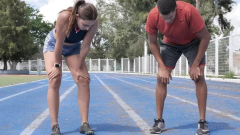 Stock Video A Sports Boy And A Girl Exhausted After Running Live Wallpaper For PC - Free Live Wallpaper
