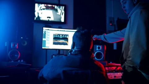 Stock Video A Sound Engineer And Singer Working On A Track In Live Wallpaper For PC - Free Live Wallpaper