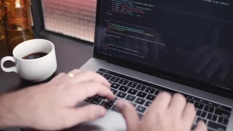 Stock Video A Software Developer Working And Drinking Coffee Live Wallpaper For PC - Free Live Wallpaper