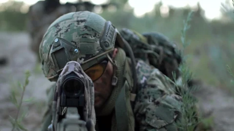 Stock Video A Sniper Laying On The Ground Is Aiming Live Wallpaper For PC - Free Live Wallpaper
